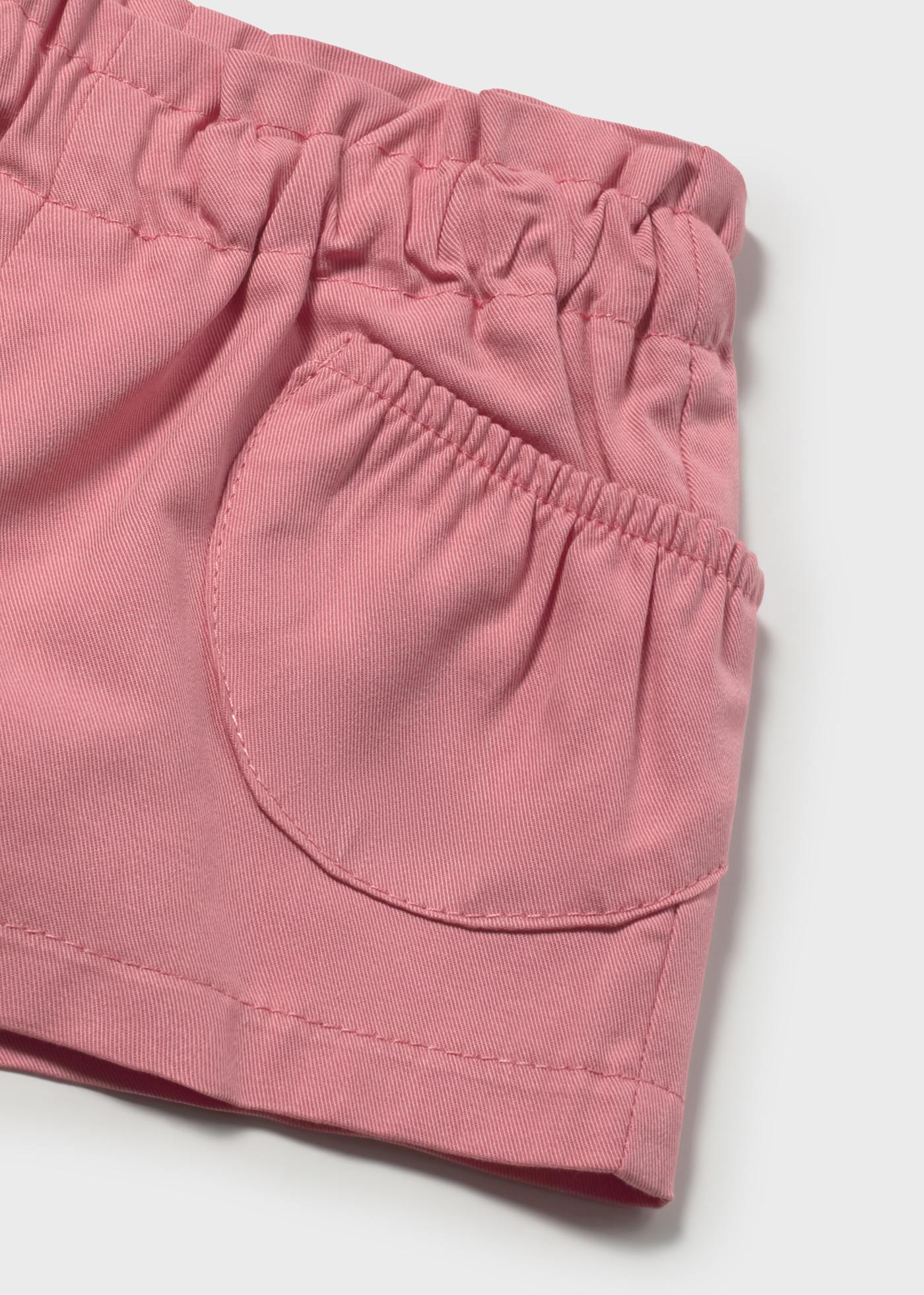 Pantalón corto bolsillos recién nacida