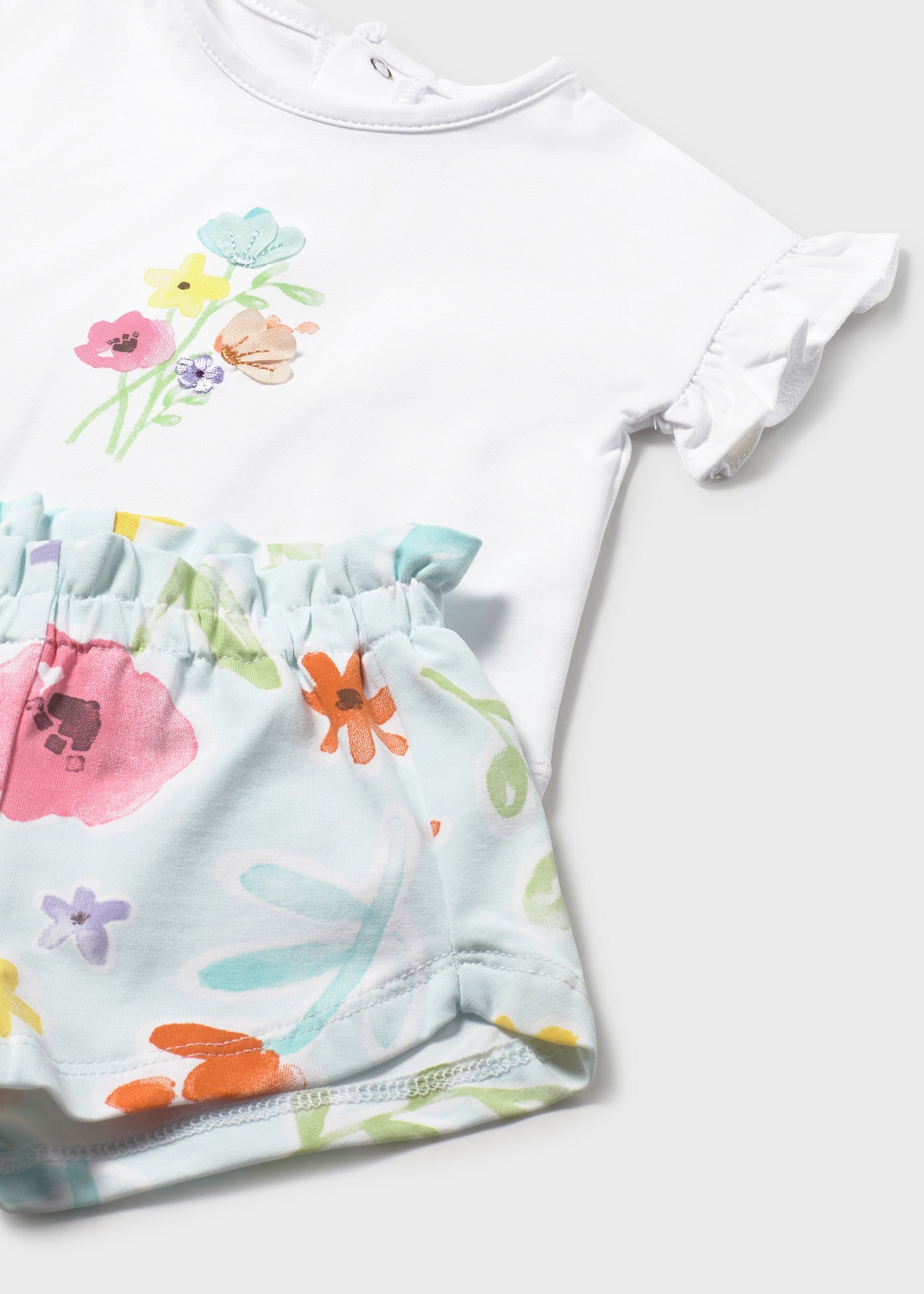 Conjunto pantalón corto estampado y camiseta recién nacida