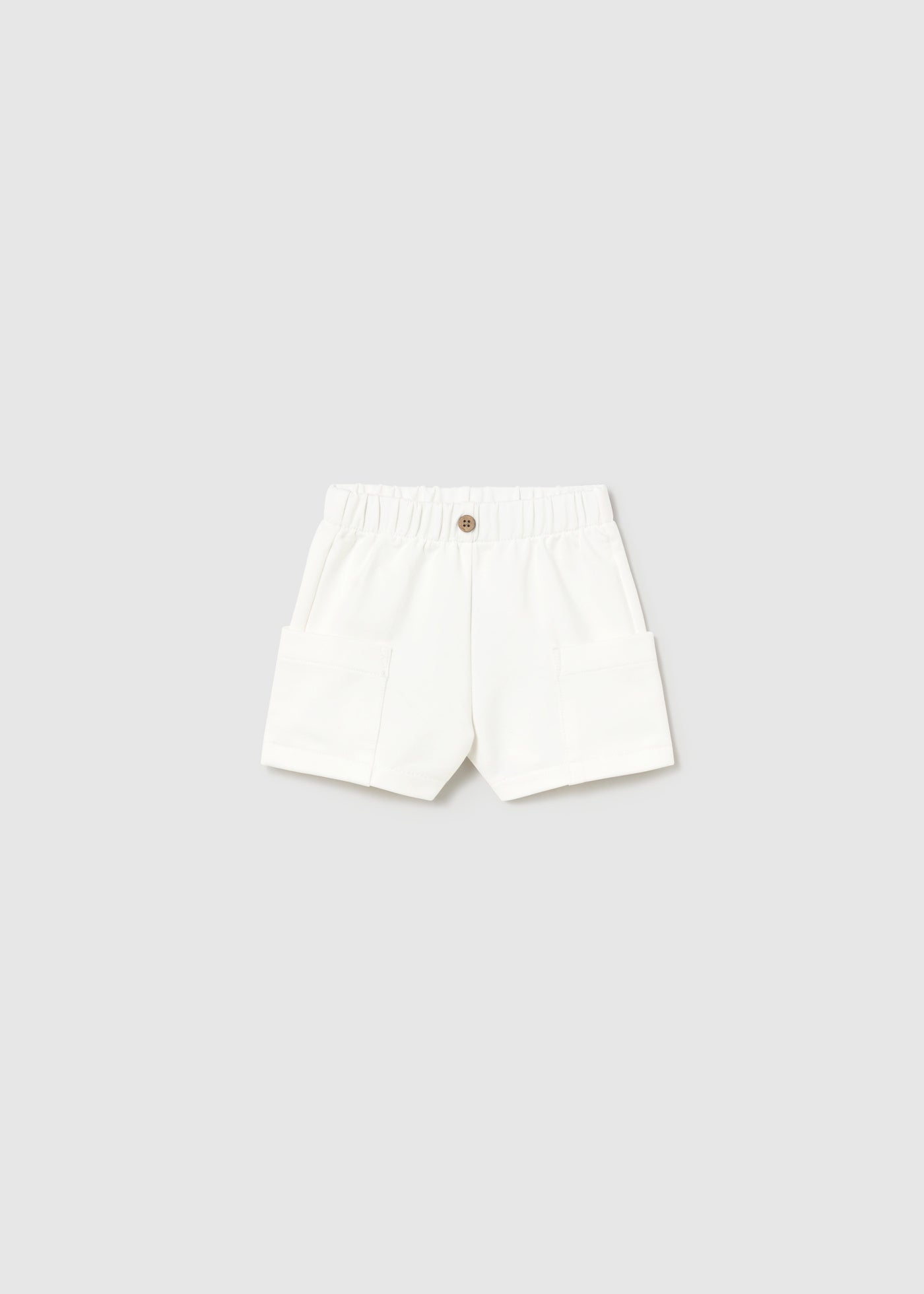 Pantalón corto bolsillos recién nacido