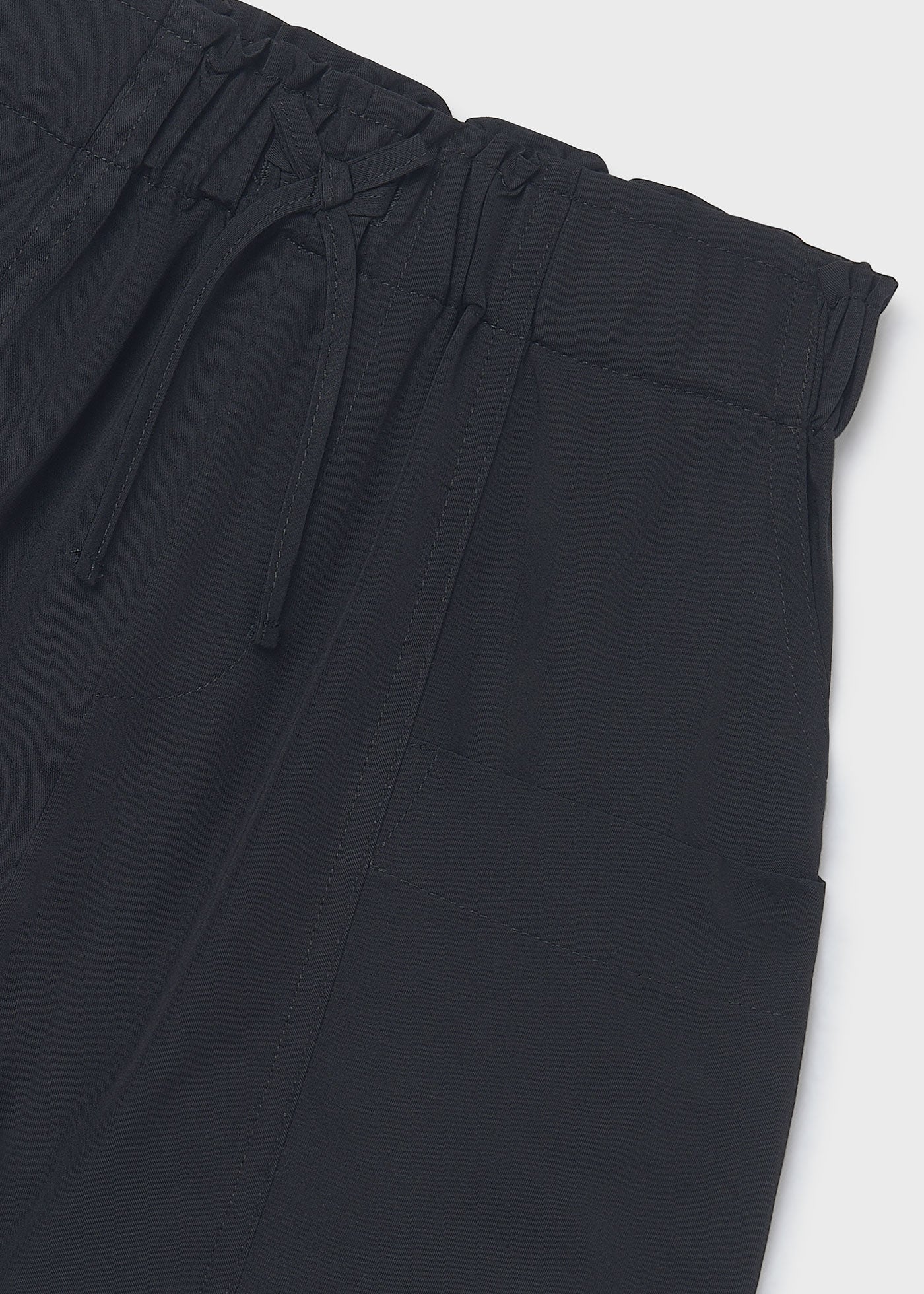 Pantalón corto bolsillos chica