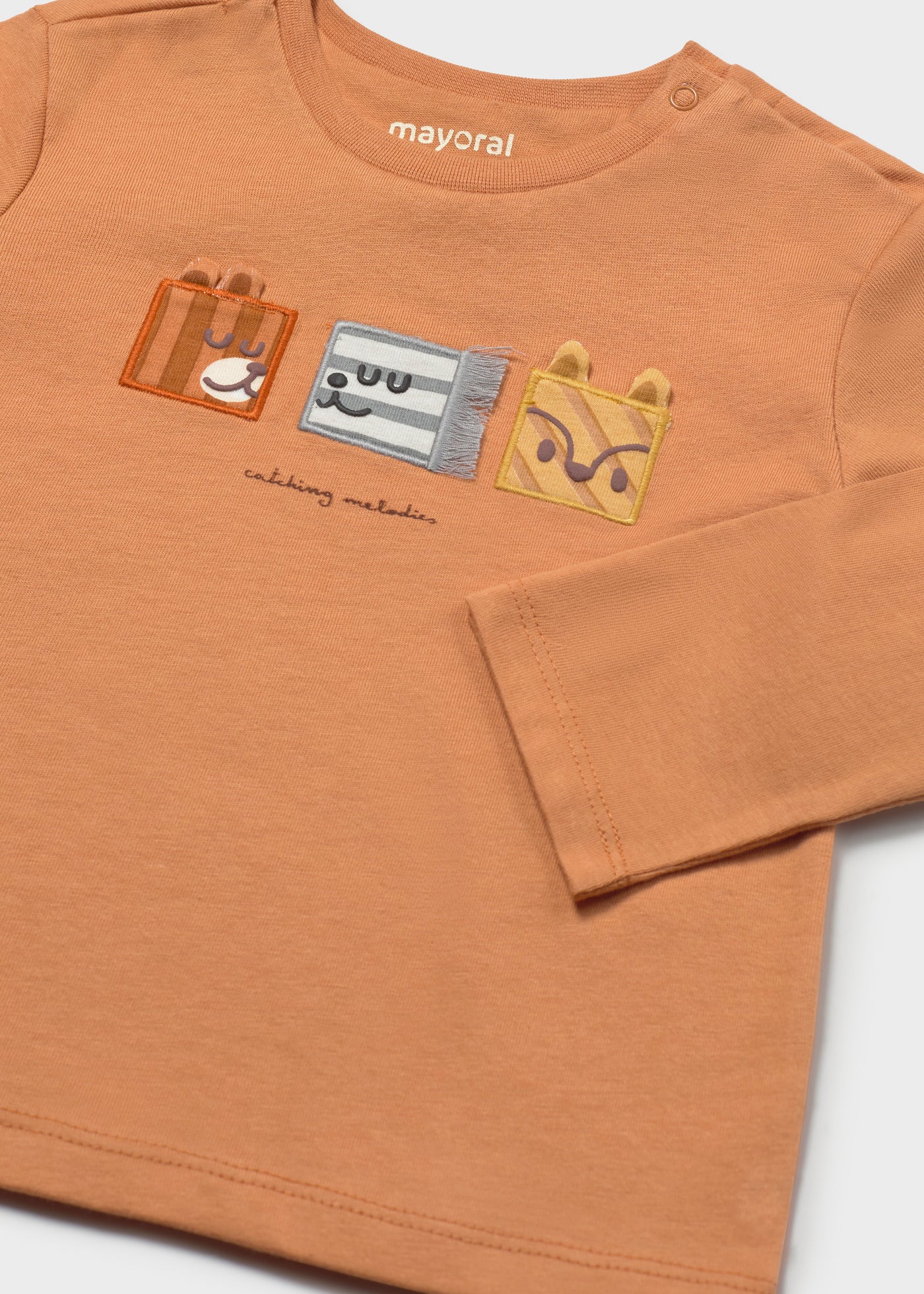 Camiseta caritas bebé