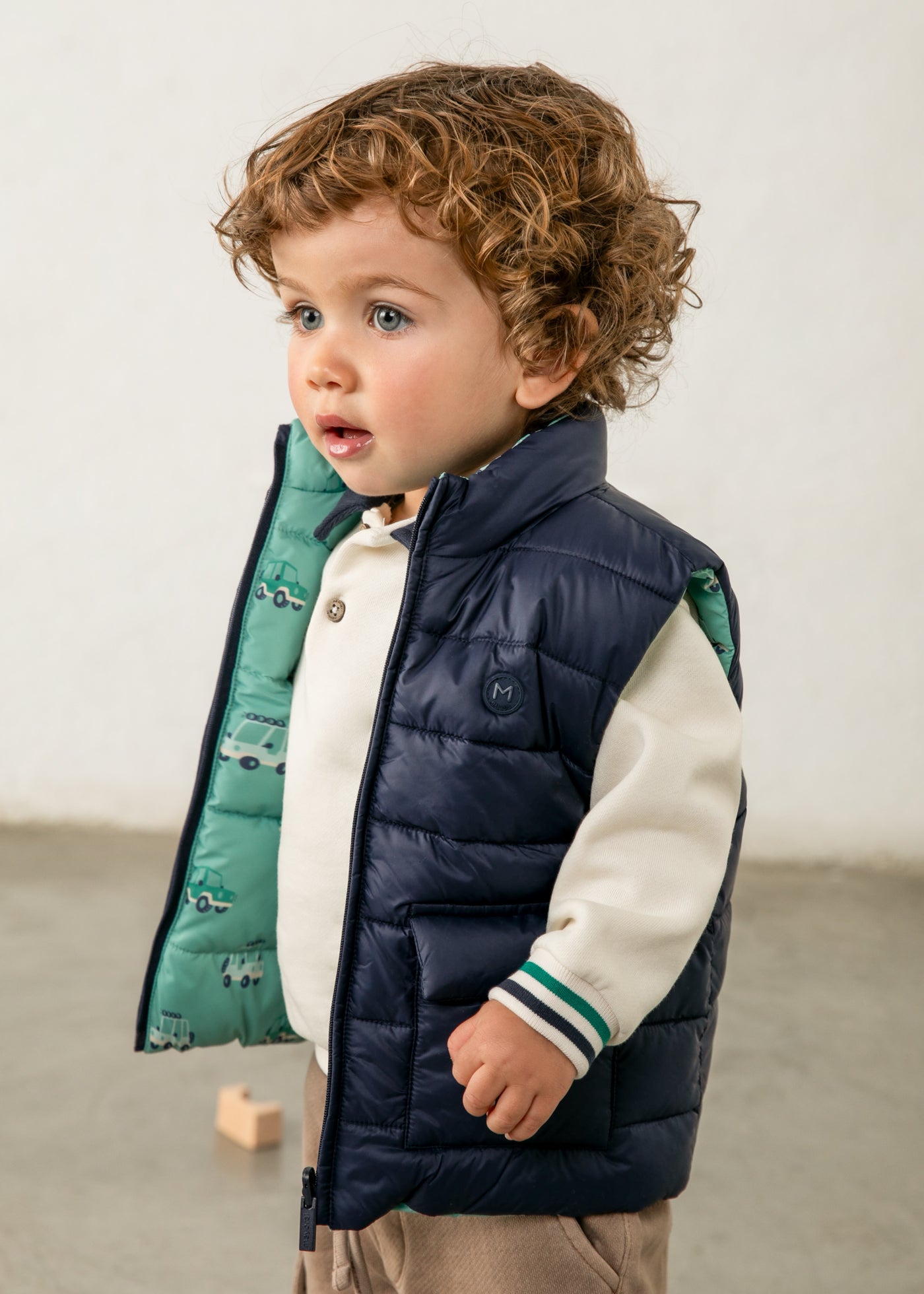 Chaleco reversible estampado bebé