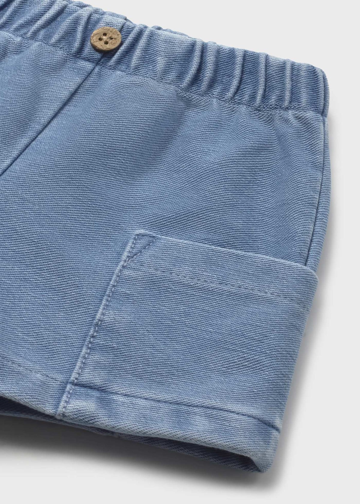 Pantalón corto bolsillos recién nacido