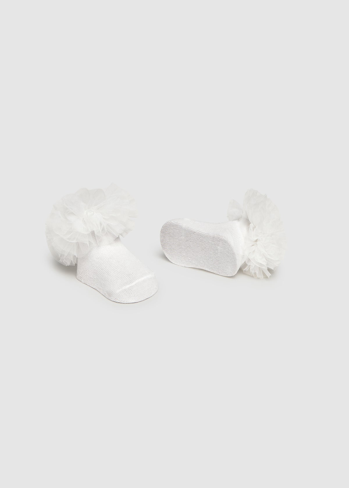 Set diadema y calcetines recién nacida